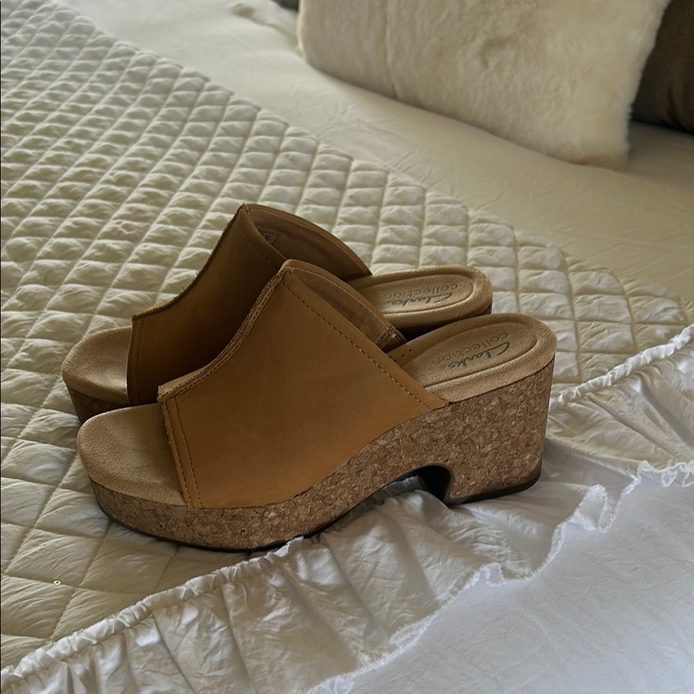 Never worn.      Clarks Tan Suede Mules with Cork Sole